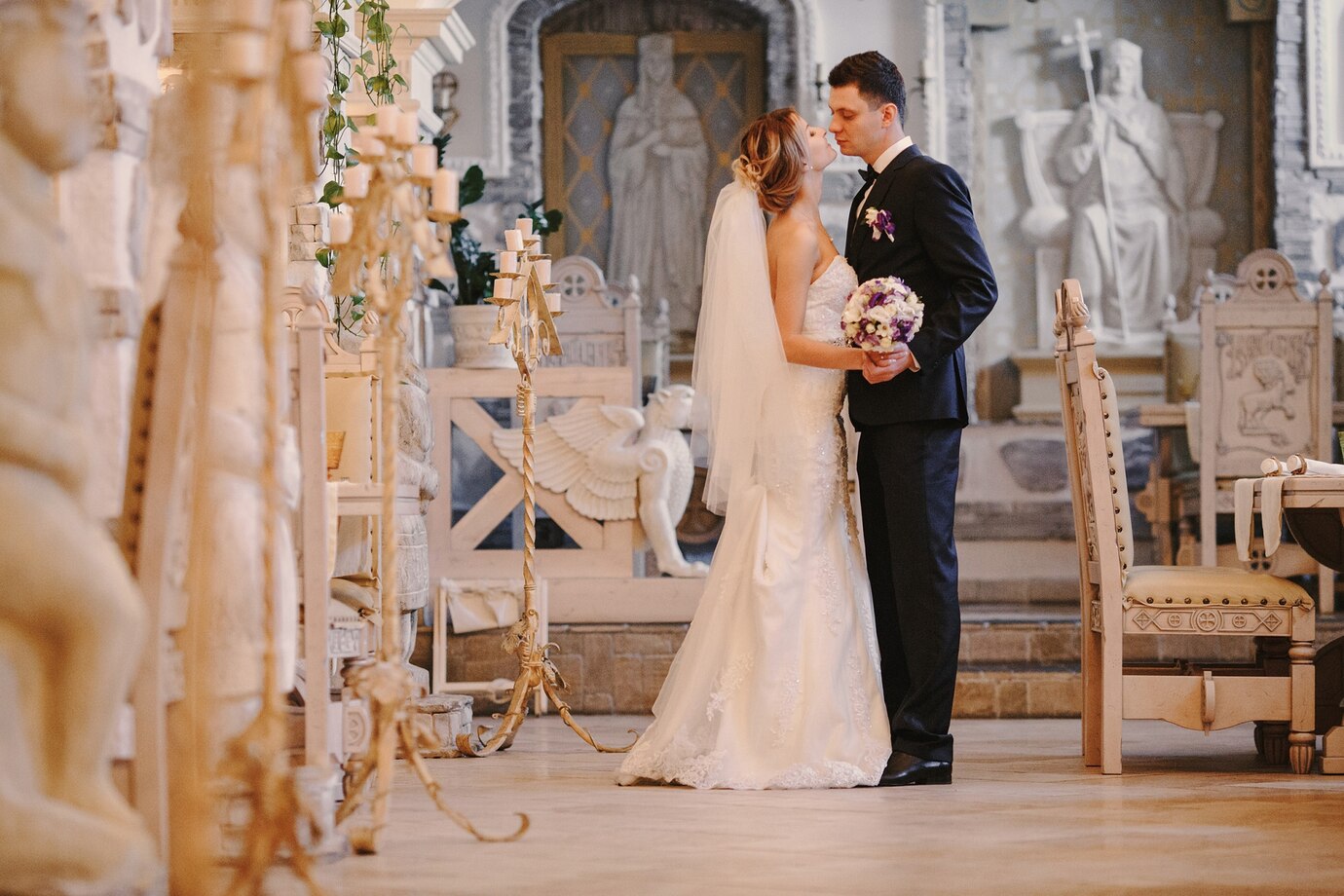 Newlyweds kissing